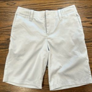 Gray under Armour boy shorts, size 10 with one spec on right leg